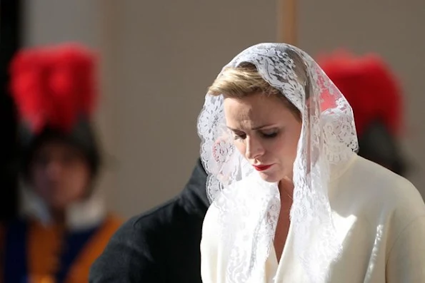 Princess Charlene of Monaco and Prince Albert II of Monaco arrives at the Apostolic Palace for an audience with Pope Francis on January 18, 2016 in Vatican City