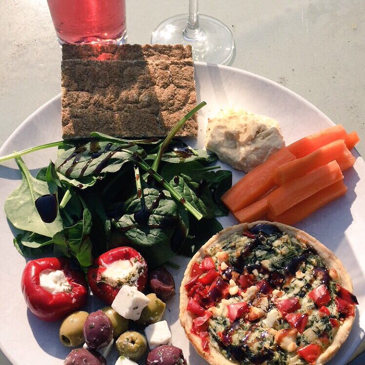 Plate of food at an outdoor picnic 