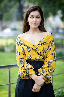 Raashi Khanna in white Lehenga paired with canary yellow blouse