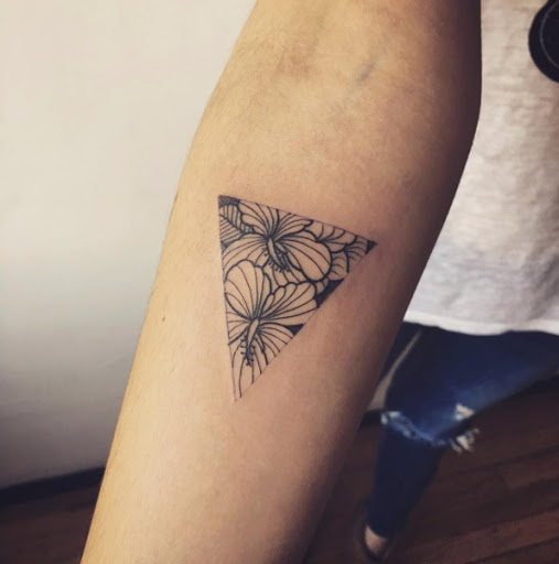 Este floral triangular glifo