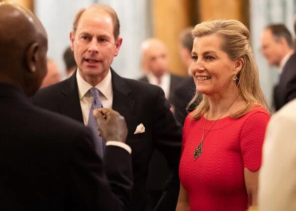 Kate Middleton wore a new red sequined tulle gown by Needle and Thread. The Countess of Wessex wore a stripe knit dress by Alaïa