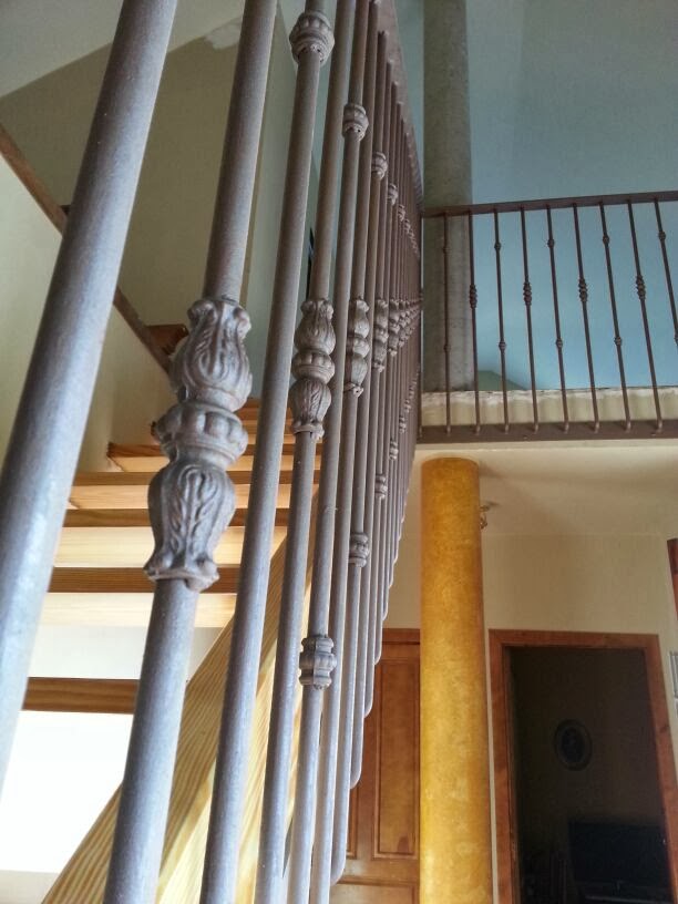 CARPINTERO FERNANDO G. CALLEJA: ESCALERA EN FORJA Y MADERA