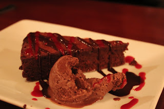 Chocolate cake with raspberry sauce at Masona Grill, West Roxbury, Mass.