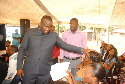 pastor selling umbrellas 