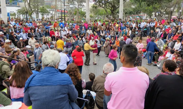 Local people gathering to dance in Parque Kennedy, a popular thing to do in the Miraflores district of Lima Peru