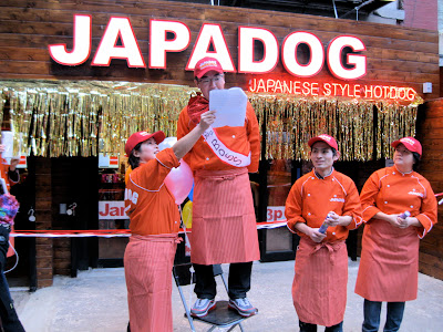 Noriki Tamura a respresentative of Japadog New York City makes an announcement
