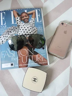 porsche p8478 sunglasses flatlay with elle mag