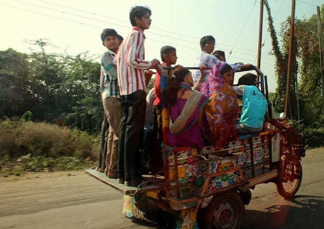 Passengers on a Chagda or rickshaw in Gujarat