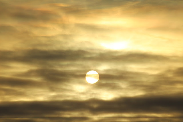 Hazey early morning sun through clouds