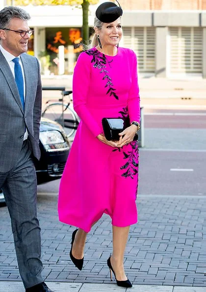 Queen Maxima wore Oscar De La Renta pink midi dress