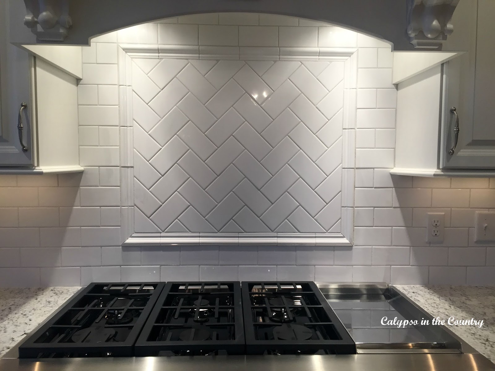 Herringbone Pattern Subway Tile over Stove - White Subway Tile with White Grout