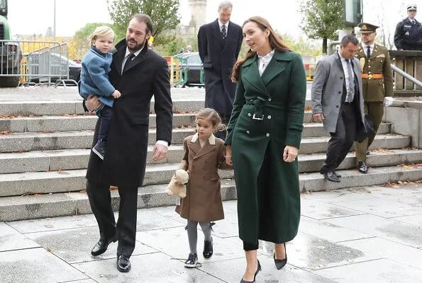 Prince Felix, Princess Claire and their children Princess Amalia and Prince Liam. Maria Teresa. Claire worn a green wool trench coat