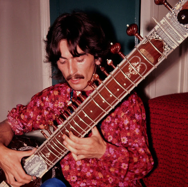 PAUL ON THE RUN Beatle Harrison's sitar auctioned for 62,500