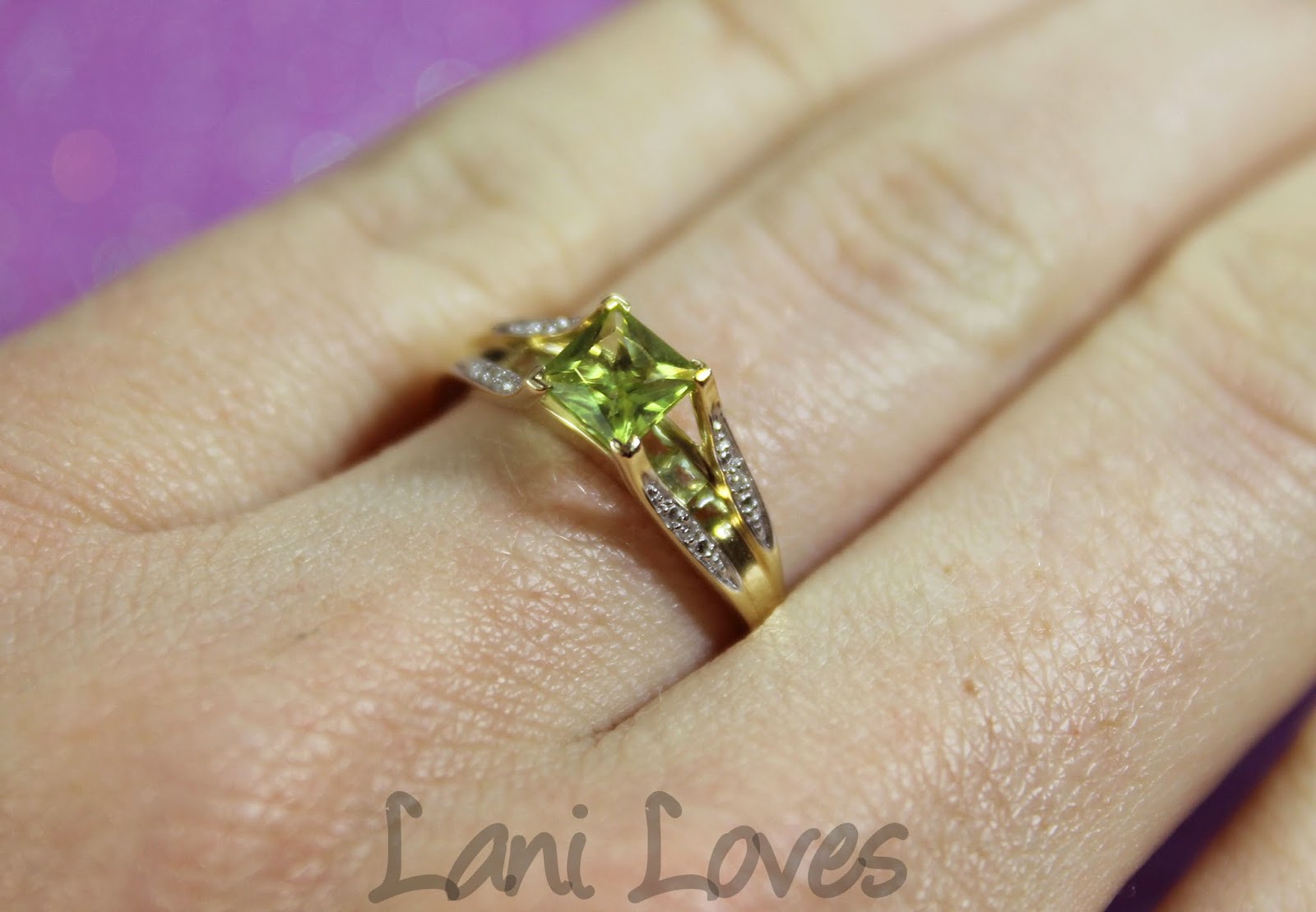 Peridot and diamond engagement ring