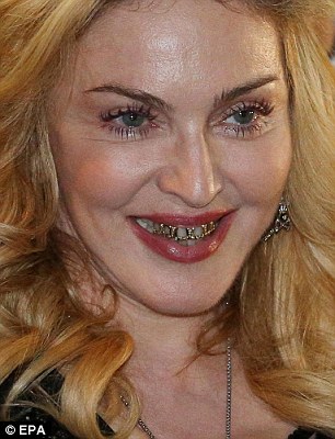 Madonna+Gold+Grills+At+Hard_Candy+Fitnes