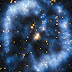 Teleskop Antariksa Hubble Jepret Nebula Planeter dengan Lengan Spiral