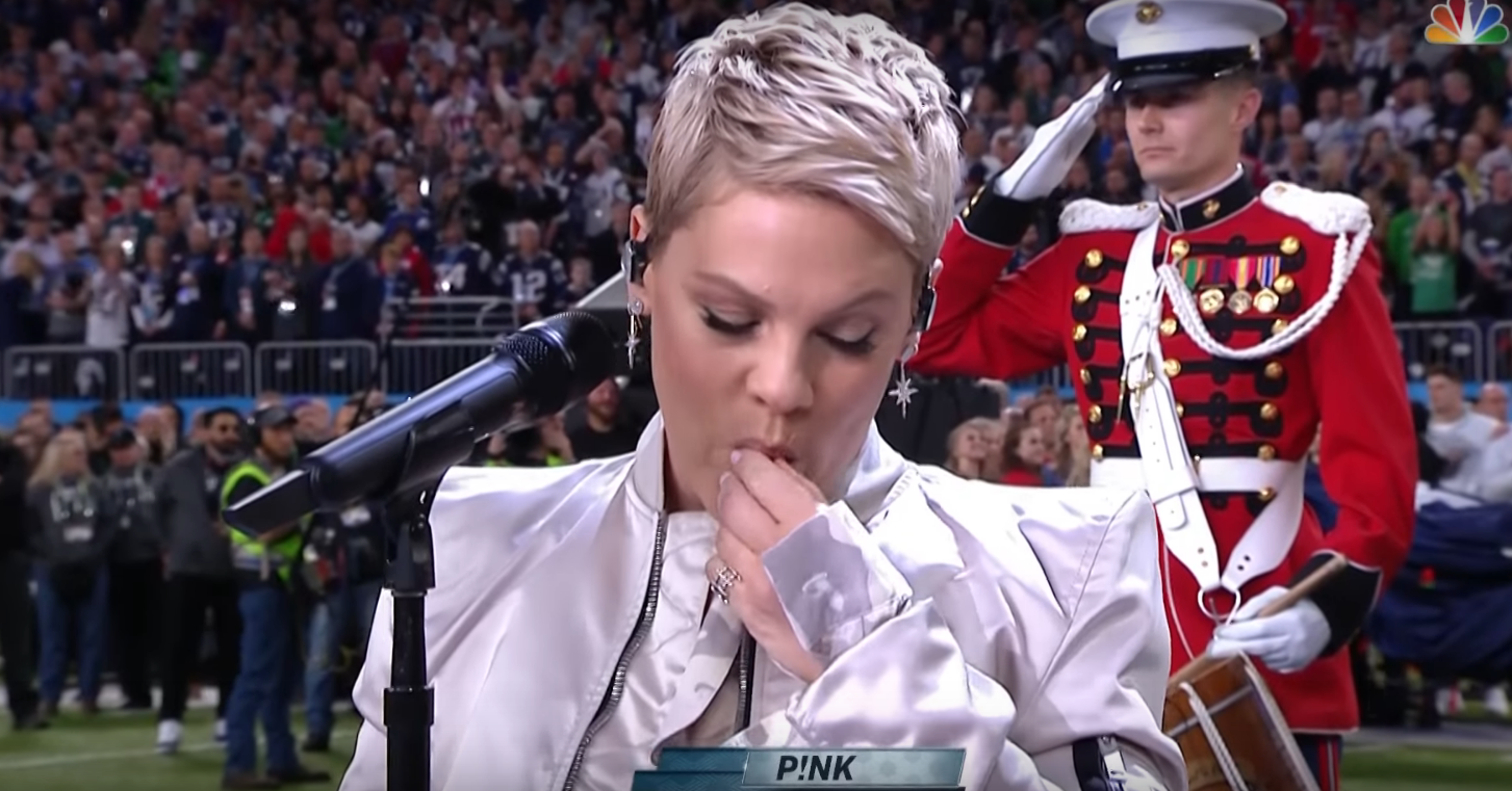 And here's Pink spitting out a cough drop before singing the national