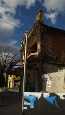 Plein air oil painting of the renovation of the Terminus Hotel corner of John and Harris Street Pyrmont painted by industrial heritage artist Jane Bennett