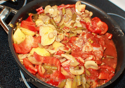 This is a stew made on the stove top all in one pan easy meal with chicken and vegetables