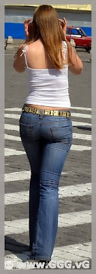 Girl in tight jeans on the street 