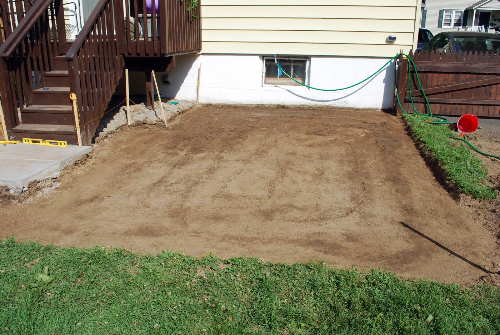 In the Little Yellow House Patio Building Digging out