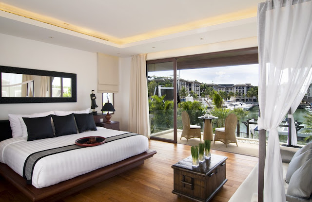 Picture of the modern bedroom looking out on the marina