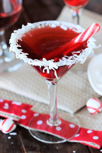 Santa's Hat Christmas Cocktail image ~ With it's fun coconut rim & bright red color, this cocktail will certainly bring on the holiday cheer!