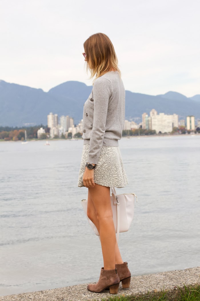 Vancouver Fashion Blogger, Alison Hutchinson, wearing a Topshop Grey embellished sweater, Topshop Grey skater skirt, Vince Camuto brown ankle booties, a white tote from Zara and pink framed sunglasses from Urban Outfitters
