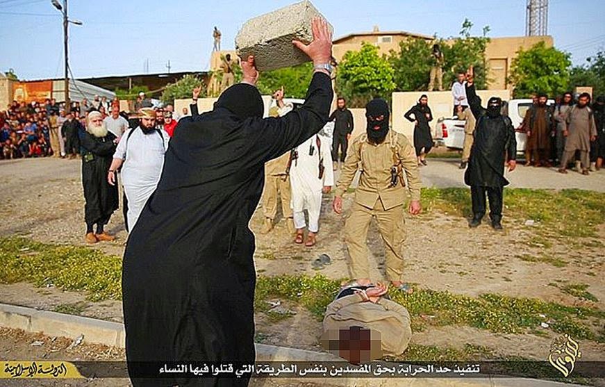 ISIS Terror group smashes thieves’ heads with concrete blocks