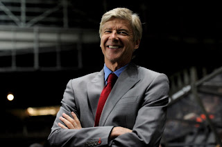 Wenger-laughing.jpg