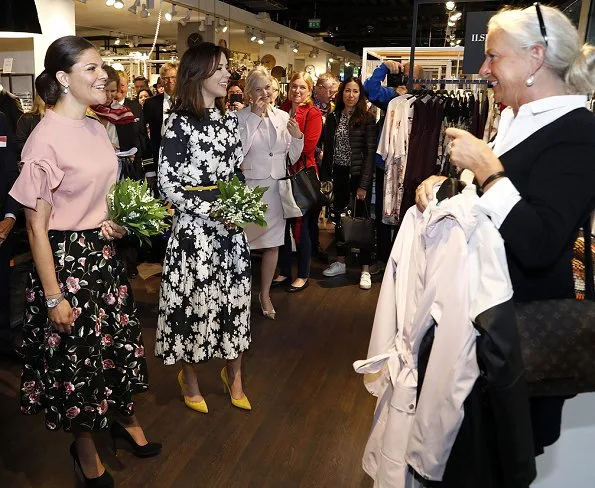 Crown Princess Mary wore Gianvito Rossi Pumps in Yellow, floral printed dress. Crown princess Victoria wore silk blouse