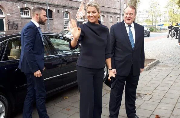 Queen Maxima visited Verkadefabriek in s-Hertogenbosch city. Susanne Friis Bjørner gold earrings and Natan top and pants