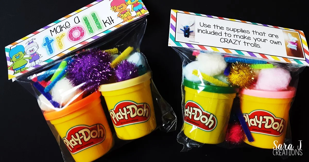 Make a Troll kit includes a FREE printable bag topper for you.  Add some playdough, cotton balls and decorations and you are ready to make some trolls.  Makes the perfect troll themed birthday goody bag.