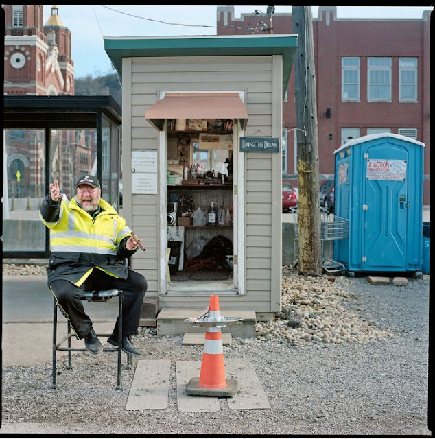 Just A Car Guy the isolation of a parking lot attendant sitting in his