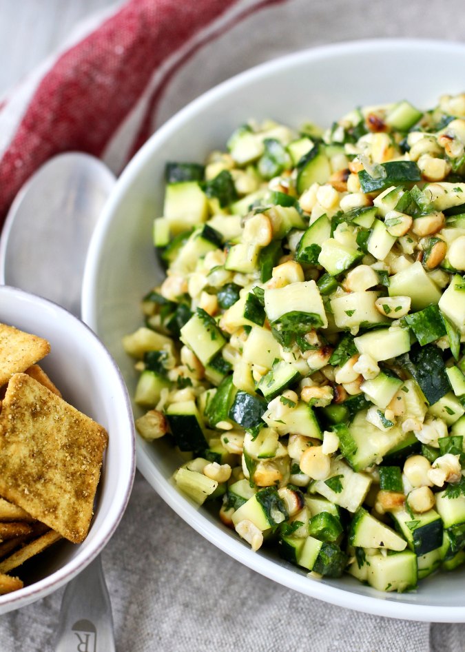 Corn and zucchini salad with crackers 