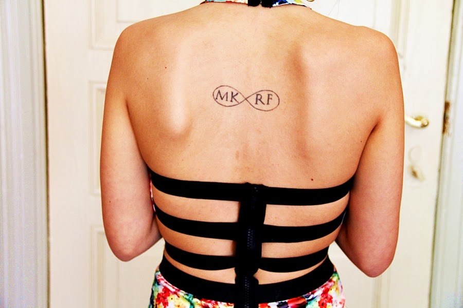 fashion back inked tattoo