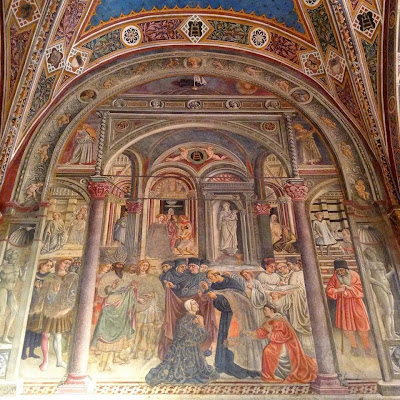 Pellegrinaio, Siena: Il dono dell'abito al rettore (Priamo della Quercia, 1442).