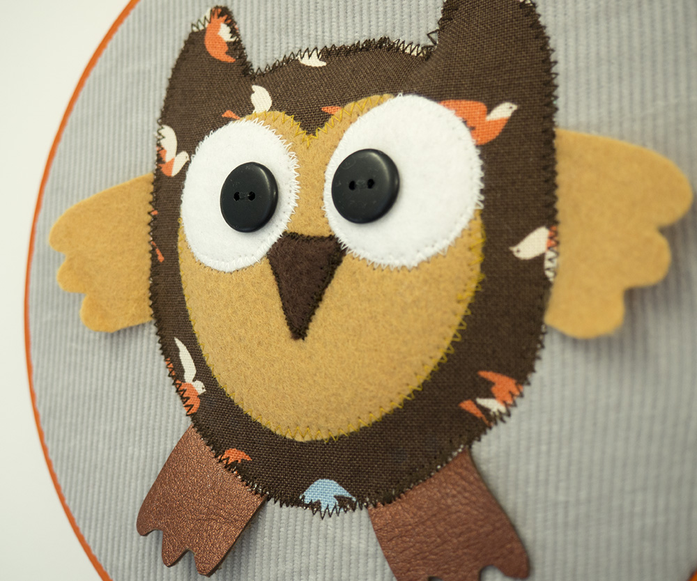 We laugh indoors owls in embroidery hoops We laugh indoors owls in embroidery hoops
