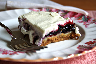 Blueberry cheesecake squares - Blueberries sandwiched between a thin cheesecake layer and sweet whipped cream 