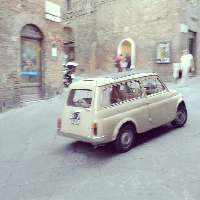 Driving in Siena: small is beVespa parking in Siena's town center autiful