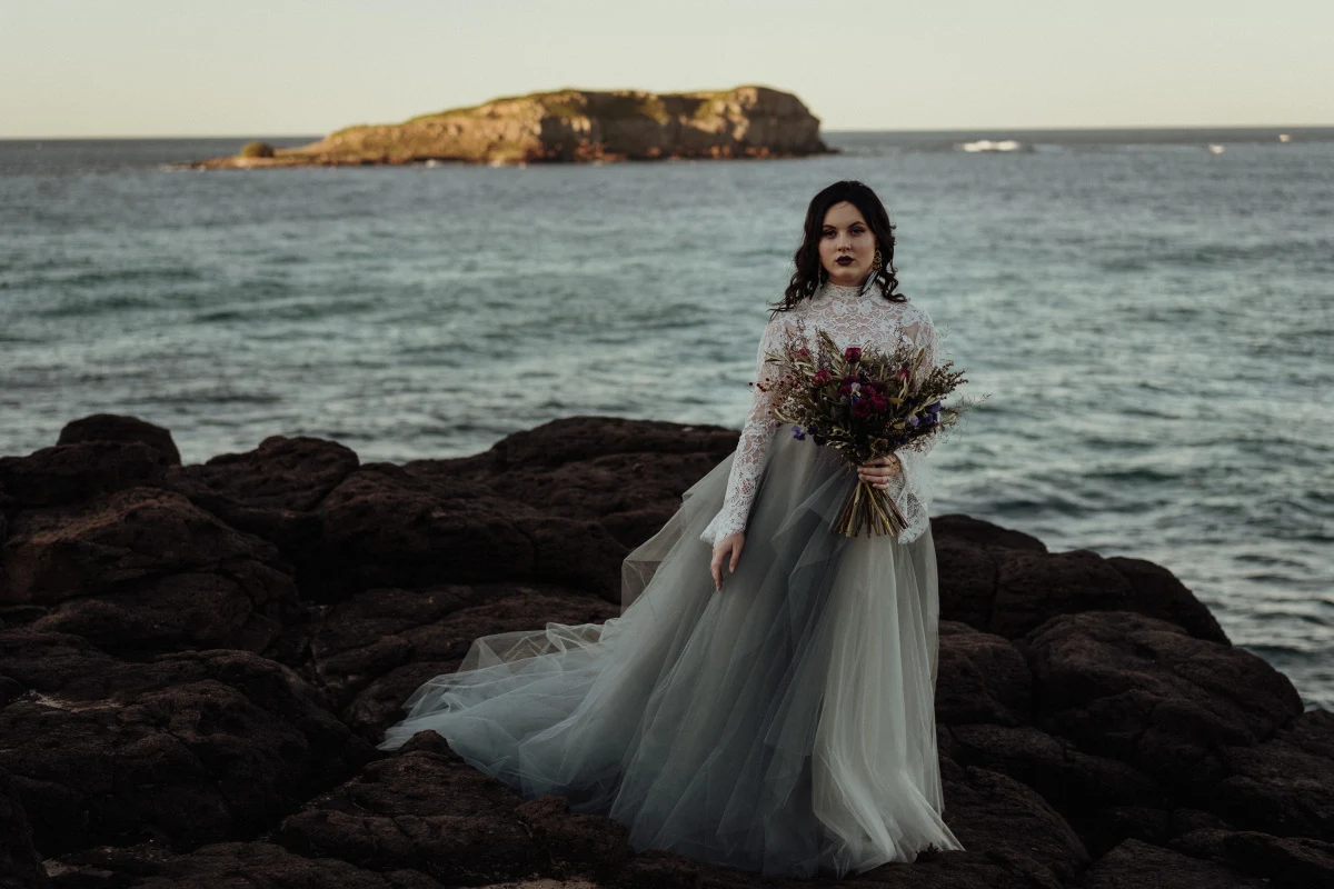 white parrot film and photography beach wedding elopement australian designer dark moody bridal fingal head