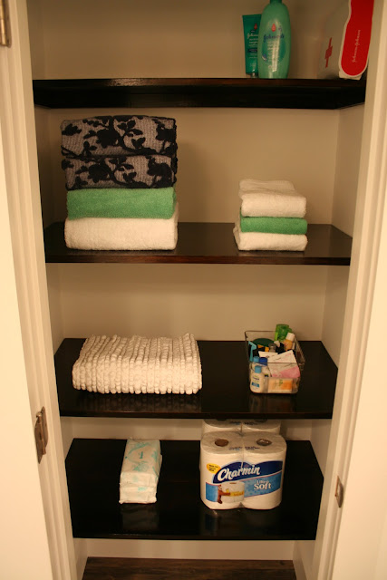 Dark Polyshades stained bathroom closet shelves in Espresso gloss | The Lowcountry Lady