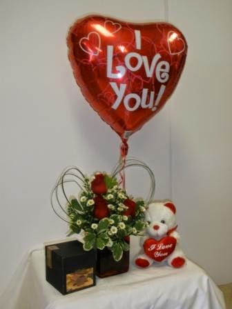 valentine's day flowers with a sweet doll for girlfriend