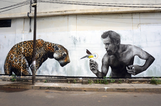 Evoca1 Mural Cheetah, Man And Bird in Tarapoto