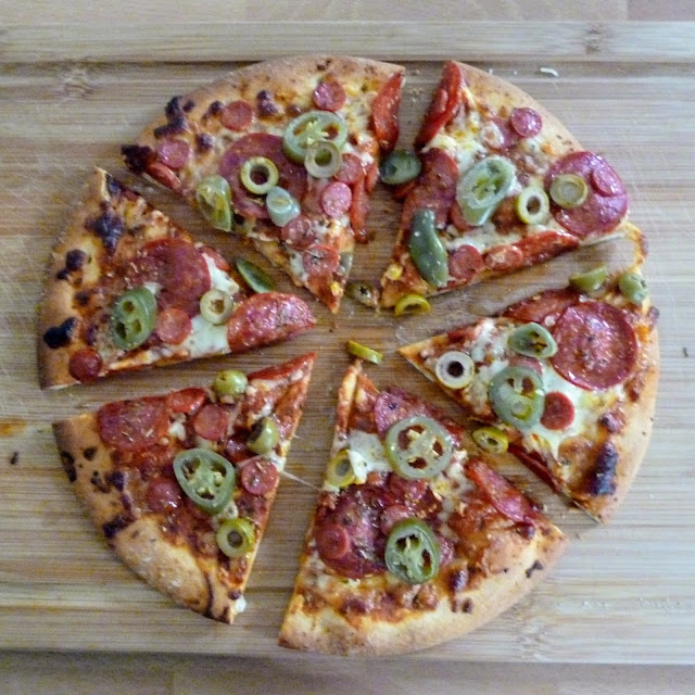 pizza cut to resemble trivial pursuit wedges