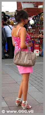 Girl in pink skirt on the street