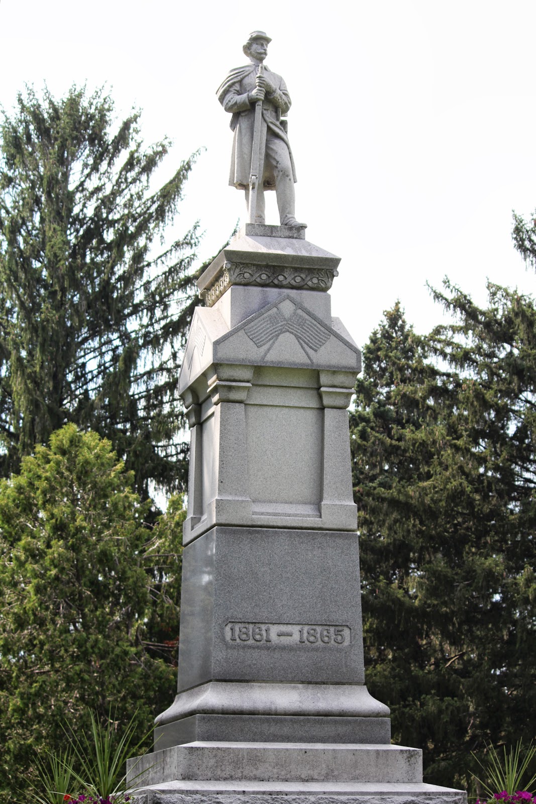 ... Wall, and Bellman Carillon Tower , also located at Evergreen Cemetery