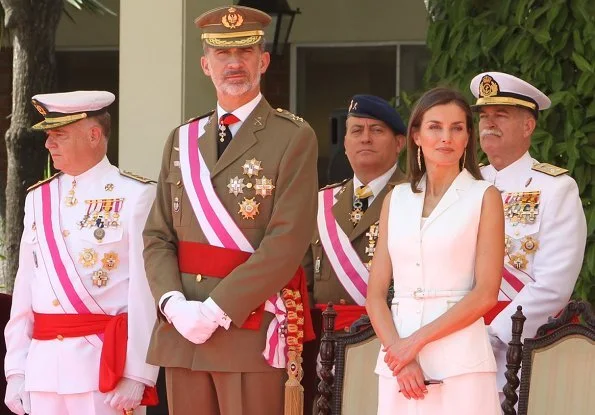 Queen Letizia of Spain wore Felipe Varela dress and Carolina Herrera suede pumps, carried Carolina Herrera bag from Camelot collection