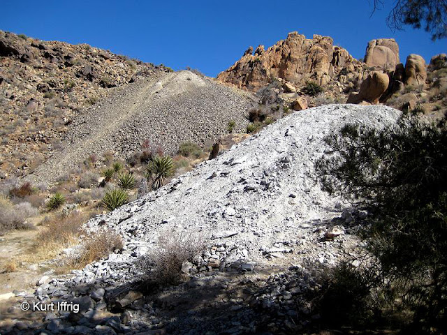 65 foot tall tailings from two of the Desert Queen Mine's four vertical shafts.