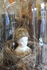 Vintage Doll Head in Nest